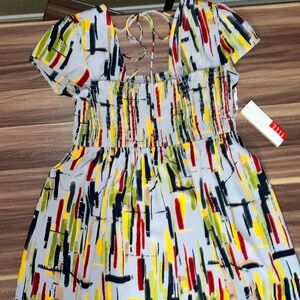 Elle geometric print cap sleeve shirt